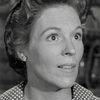 Claudia Bryar as Mrs. Simpson