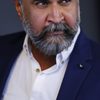 Adithya Menon as General R.K. Bala