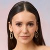 Nina Dobrev as Carrie