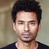Anil Raman as Aaron