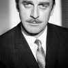 John Dehner as Mr. Bascombe