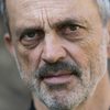 Jacek Koman as Wozniak