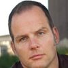 Adrian G. Griffiths as Tom Ackhurst