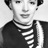 Elaine Barrie as Simone