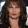 Beata Pozniak as Rhea Clyman