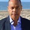 Tyrone Mitchell Henderson as District Attorney