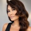 Tia Carrere as Snookie / Local Woman #1 (voice)
