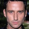 Glenn Quinn as Scott Anderson (segment "The Locket") / Paramedic #1 (segment "The Campfire")