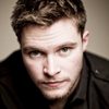 Jack Reynor as Mac