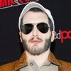 Zach Hadel as Reggie Paloni (voice)