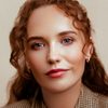 Julia Brown as Laura