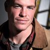 Adam Cole as Sander Monk