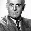 Moroni Olsen as Congressman Stone