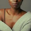 Manda Touré as Woman at the aquarium