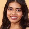 Megan Suri as Caroline