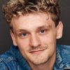 Ben Cook as Race