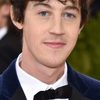 Alex Sharp as Rennie Davis