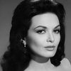 Lisa Seagram as Woman (uncredited)
