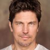 Michael Trucco as John