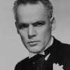 Henry Hull as Dr. Becker