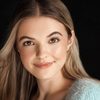 Madison MacIsaac as Izzy Simpson