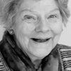 Vilma Hollingbery as Woman in Street