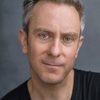 Jonathan Rhodes as Reporter