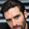 Ciaran McGlynn as Waiter in club