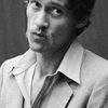 John Holmes as Porno star on TV (archive footage)