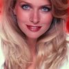 Donna Dixon as Laura Rollins