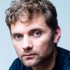Morten Svartveit as Adoptive Father