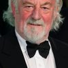 Bernard Hill as Dennis