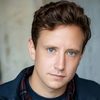 Stuart Maxheimer as Warehouse Worker