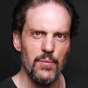 Silas Weir Mitchell as Bryan Adams