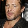 Costas Mandylor as Interpol Regional Chief Henry