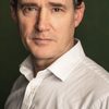 David Bark-Jones as Golf Exec