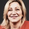 Edie Falco as Sharon