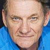 Anthony Phelan as Trader