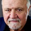 Steve Eastin as Father Albright