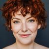 Emma Pedersen as Bank Associate