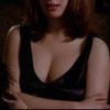 Marianne Morris as Topless Girl in the Flat