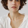 Kim Ostrowskij as Médica