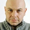 Prodromos Antoniadis as Professor Karadimos