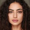 Medalion Rahimi as Margaret