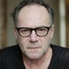 Eric Franquelin as Caron, l'agent DGSE de Paris