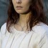 Alwena Brehin as Flora Longhlin