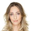 Carolina Cardinale as News Anchor Deborah Ritler