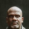 Philip Luswata as Minister Aloysius Kyazze