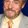 John Rhys-Davies as Professor Harisson