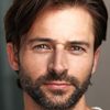 Brian Ames as Ralph Savage